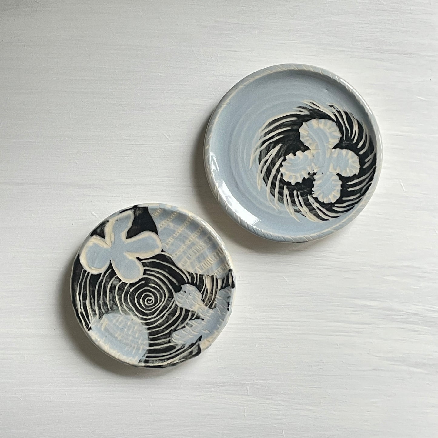 Pair of little plates for sushi, rings, cakes, wall display in soft blue and black